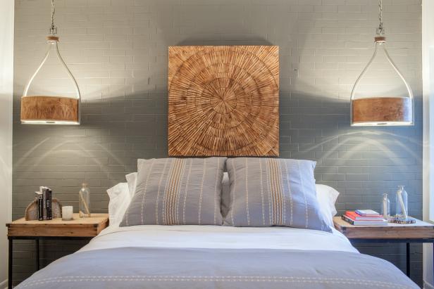 Modern Wall Art and Lighting Fixtures in Master Bedroom 