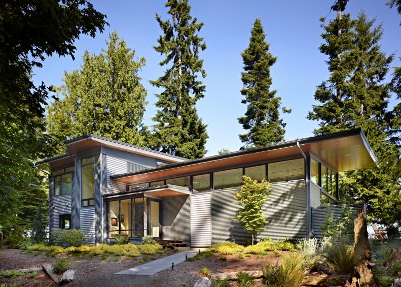 Gray Metal Exterior With Evergreen Trees