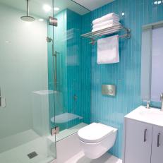Turquoise Master Bathroom With Glass Enclosed Shower 