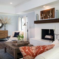 White Fireplace in Renovated Living Room 