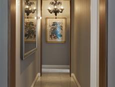 Transitional Hallway With Neutral Marble Floor