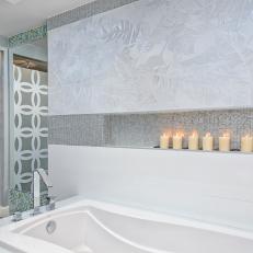Textured Bathtub Surround With Mosaic Tiles