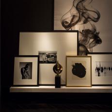 Gallery Wall With Floating Shelf and Black and White Art
