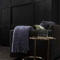 Black Armchair and Metal Side Table