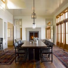Cottage-Style Dining Room With White Paneled Walls