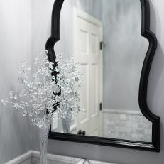 Contemporary Bathroom Features Custom Black-Framed Mirror