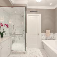 Luxe Gray Bathroom Features Striking Marble Accents