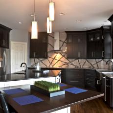 Transitional Eat-In Kitchen Features Black Cabinetry