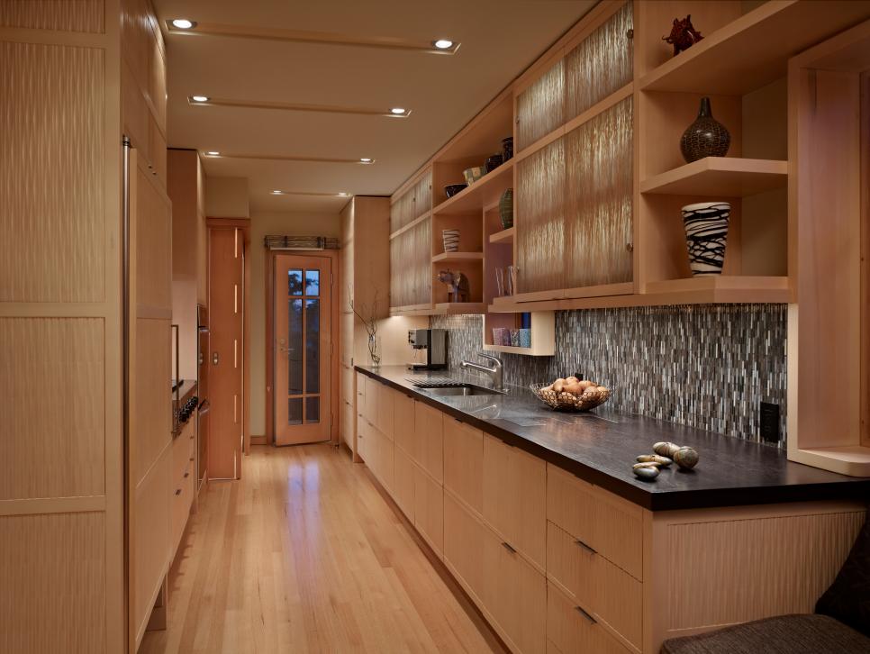 Neutral Contemporary Galley Kitchen With Light Wood Cabinets & Floors