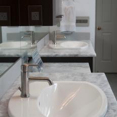 Contemporary Master Bathroom With Marble Countertops
