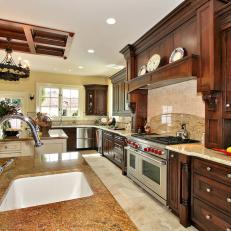 Neutral Traditional Chef's Kitchen With Wood Cabinets