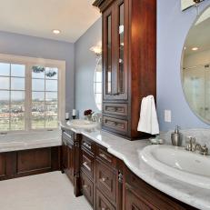 Blue Traditional Bathroom With Wood Cabinetry