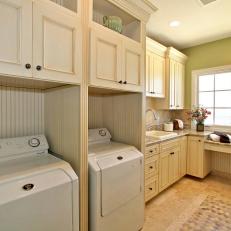 Green and White Traditional Large Laundry Room  