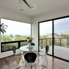 Casual Modern Black and White Dining Room With Views
