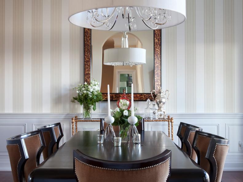 Traditional Dining Room With Striped Wallpaper and Wooden Table