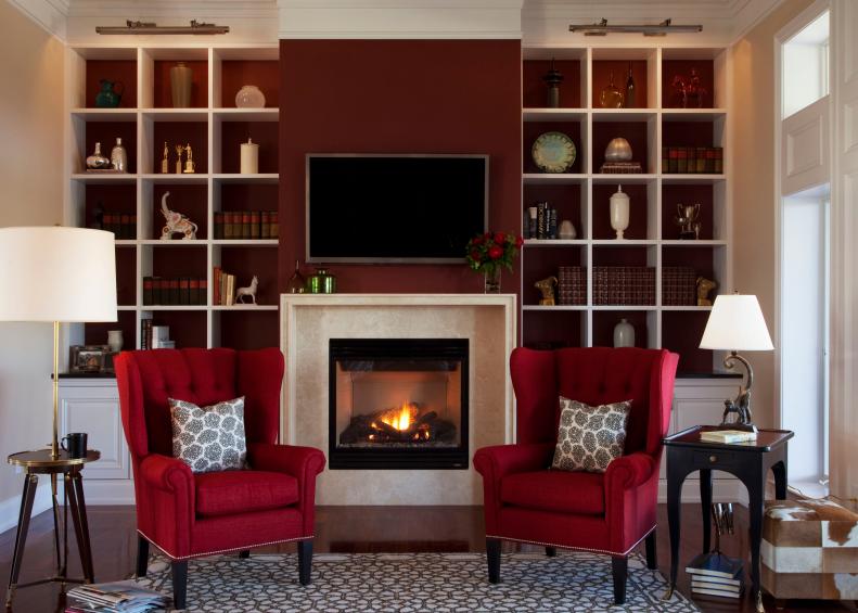 Built-In Bookshelves in a Transitional, Red Living Room