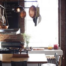 Rustic, Industrial Kitchen With Exposed Brick Walls