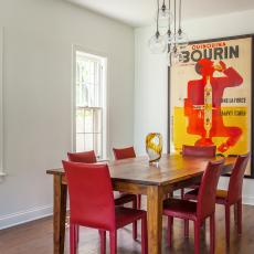 Chic Dining Room Features Modern Red & Yellow Accents