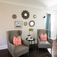Upholstered Armchairs With Graphic Throw Pillows