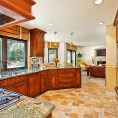 Neutral Kitchen With Brown Tile Floor