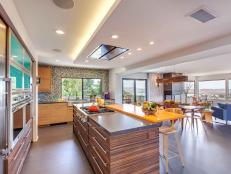 Modern Open Concept Kitchen With Large Island and Mosaic Tile Wall