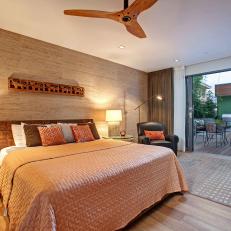 Contemporary Bedroom With Wood Accents & Patio Access