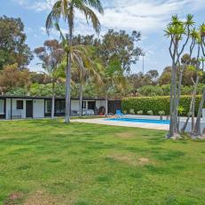 Midcentury Modern Home Boasts Sunny Backyard & Pool