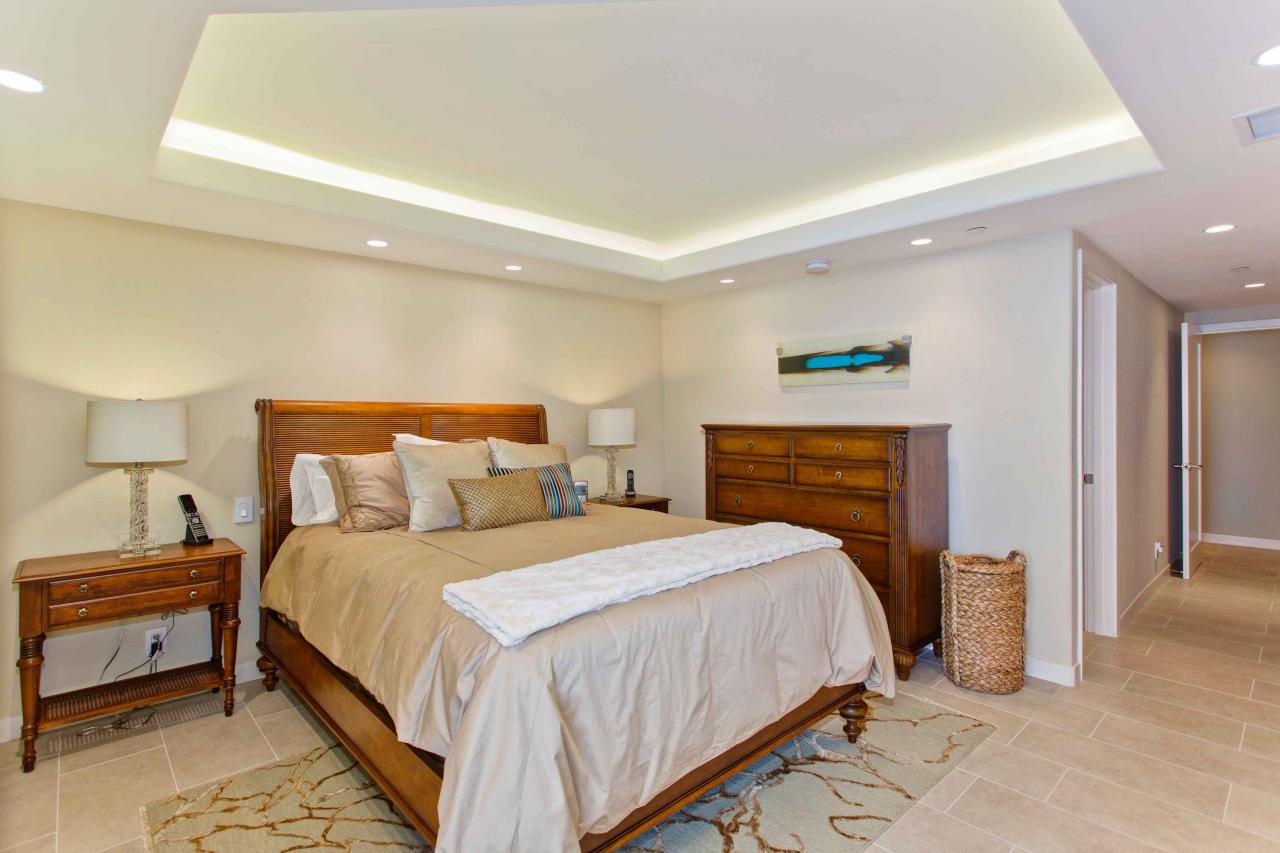 Relaxing Neutral Bedroom Boasts Lighted Tray Ceiling Hgtv