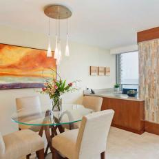 Contemporary Dining Area Features Vibrant Artwork