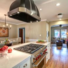 Retro Range Hood & Stainless Oven in Transitional Kitchen