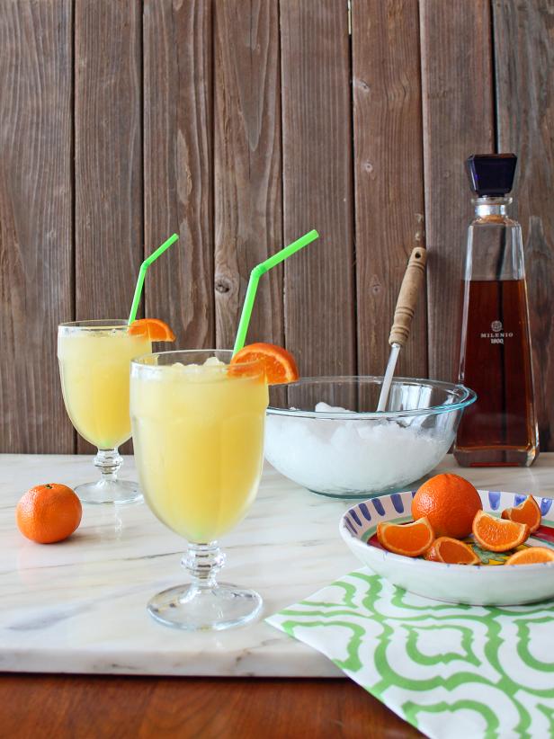 2 Homemade Margaritas With Freshly Cut Oranges
