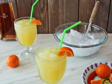 2 Homemade Margaritas With Freshly Cut Oranges