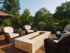 Long Rectangular Fire Pit With Wicker Patio Chairs