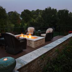 Deck With Fire Pit and Sitting Area at Nighttime