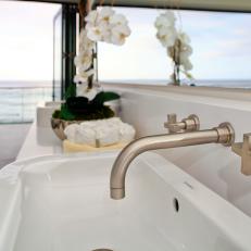 White Sink and Faucet and Ocean View