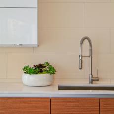 Kitchen Sink With White Tile Backsplash