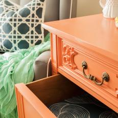 Orange Dresser With Blue Patterned Drawer Liner