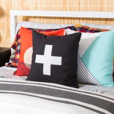 Multicolored Accent Pillows on Bed