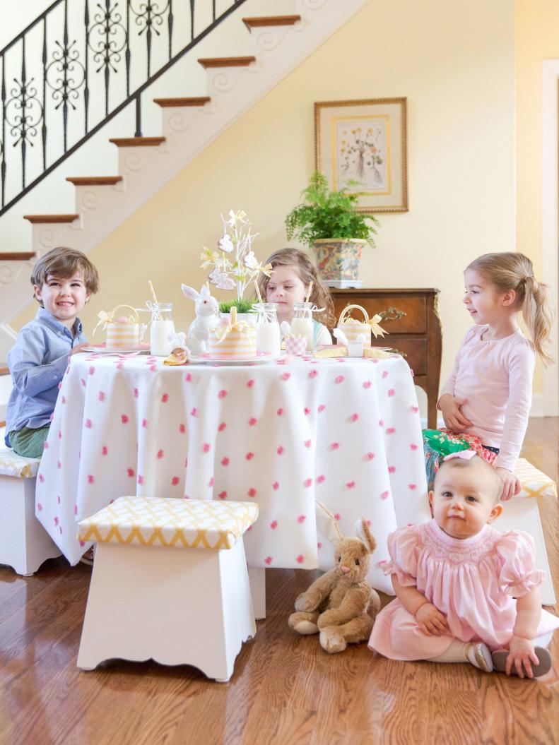 Set a coordinated pink and yellow Easter table just for the little ones complete with sweet treats, special Easter basket favors and lots of Easter egg touches. 