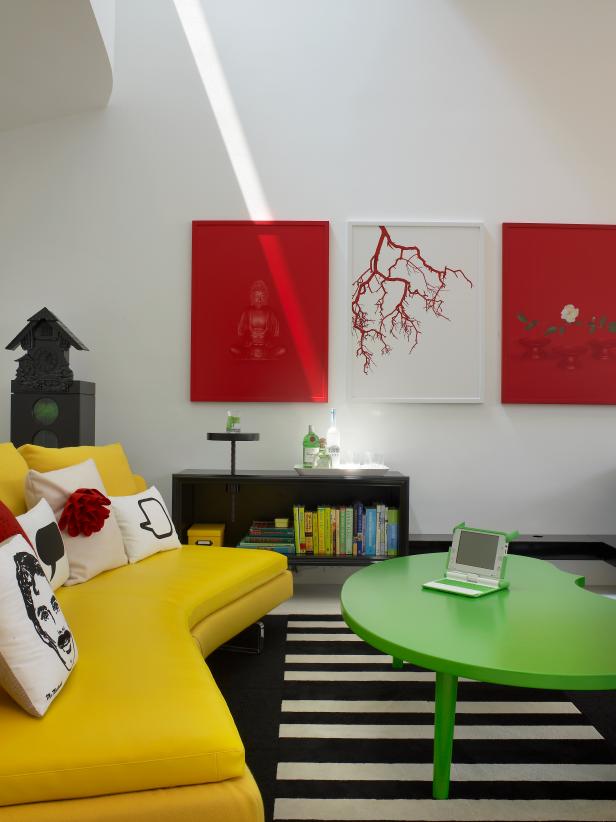 Modern Sitting Room With Yellow Sofa, Green Coffee Table & Red Art