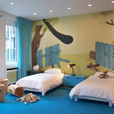Boys' Bedroom Features Large Wall Mural & Blue Accents
