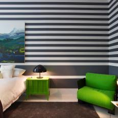 Modern Guest Room Features Striped Walls & Bold Green Accents