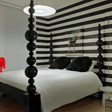 Master Bedroom With Black & White Striped Accent Wall
