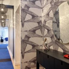 Modern Apartment Hallway Features Large Bird Wallpaper