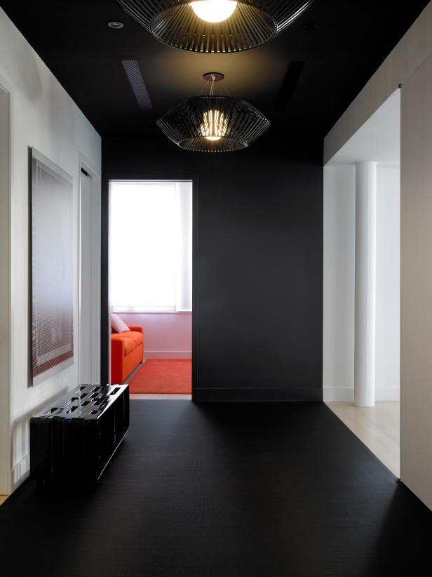 Hallway With Black Floor & Ceiling, White Walls