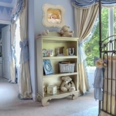 Metallic Shelf Displays Baby Accessories in Blue Nursery