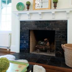 Fireplace Boasts Black Marble Surround & White Mantel