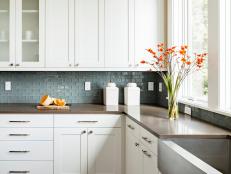 Neutral Kitchen With White Shaker Cabinets & Glass Tile Backsplash