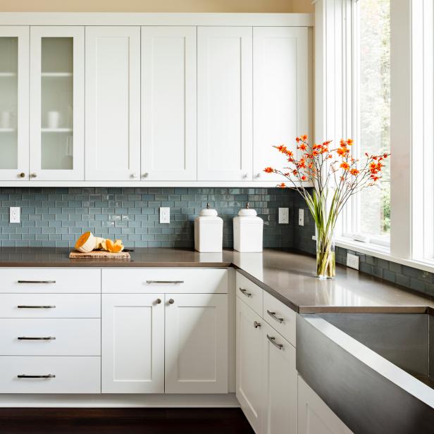 Neutral Kitchen With White Shaker Cabinets & Glass Tile Backsplash