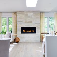 Modern Fireplace With Limestone Tile Surround